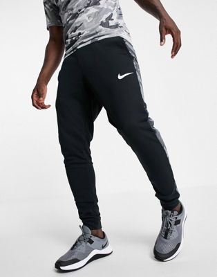 Homme Nike Training - Jogger coupe fuselée - Noir camouflage
