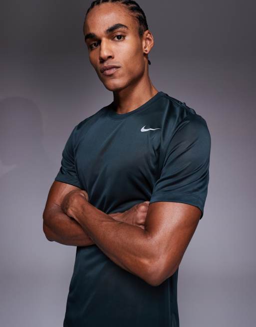 Nike Training Legend DRI-Fit T-shirt in dark green | ASOS
