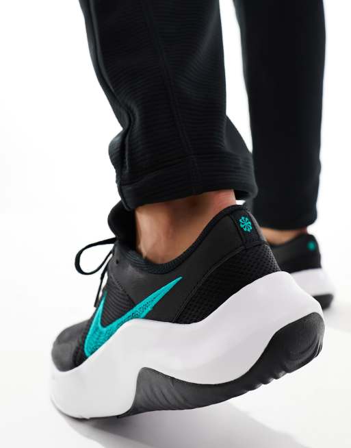 Black and teal clearance nikes