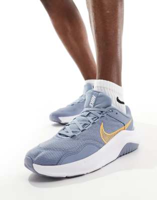 Nike Training Nike Training Legend Essential 3 trainers in grey and orange