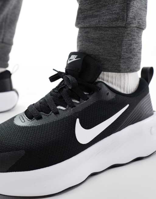 Nike Training Legend Essential 4 trainers in black and white ASOS