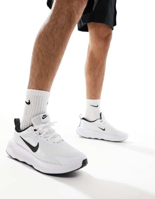 Nike Training Legend Essential 4 trainers in white and black ASOS