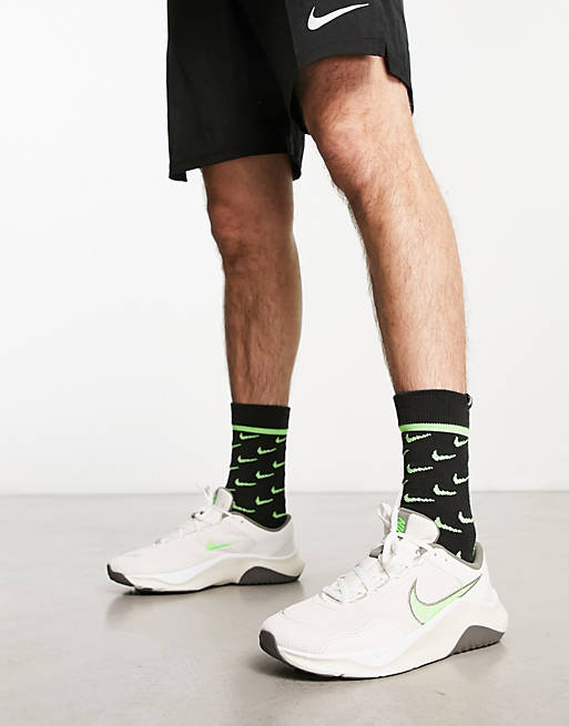 Nike Training Legend Essential trainer in white and green | ASOS