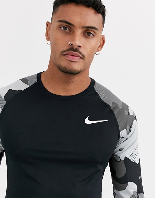 Nike Training long sleeve baselayer top with camo sleeves in black | ASOS
