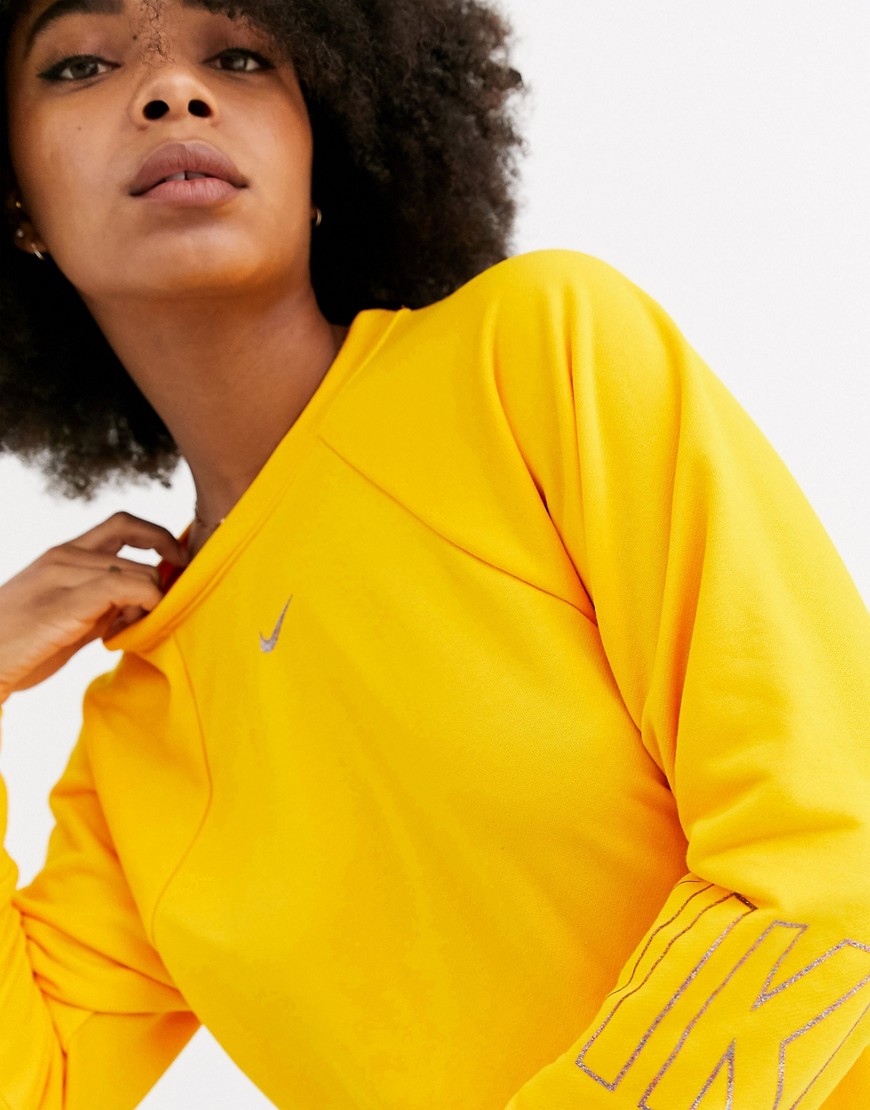Nike Training long sleeve top in yellow-Gold