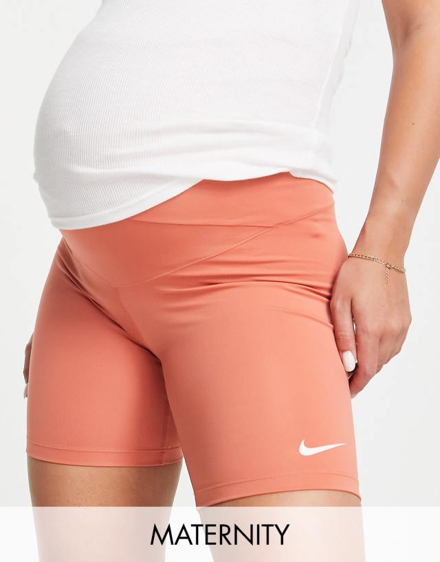 Nike Training Maternity Dri-FIT One 7-Inch legging shorts in coral