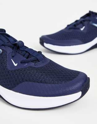 navy blue and white trainers