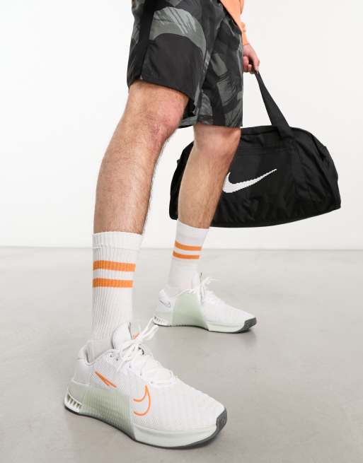 Nike Training Metcon 9 trainers in white and orange
