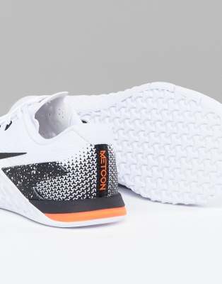nike training metcon sneakers in white and orange