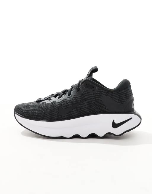 Nike Training Motiva sneakers in black and white, 2 of 5