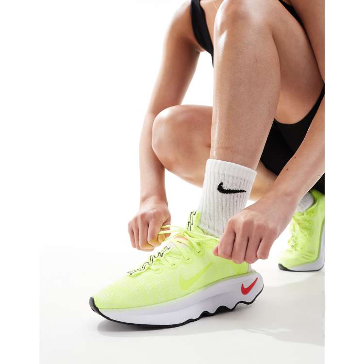 Nike Training Motiva sneakers in neon green ASOS