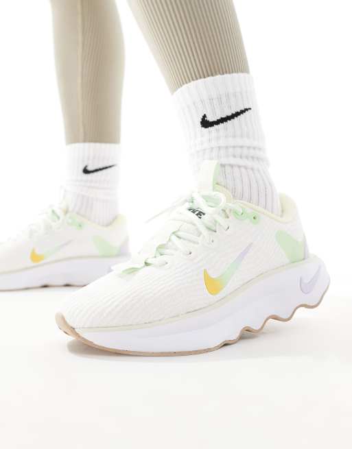 Nike Training Motiva sneakers in off white | ASOS