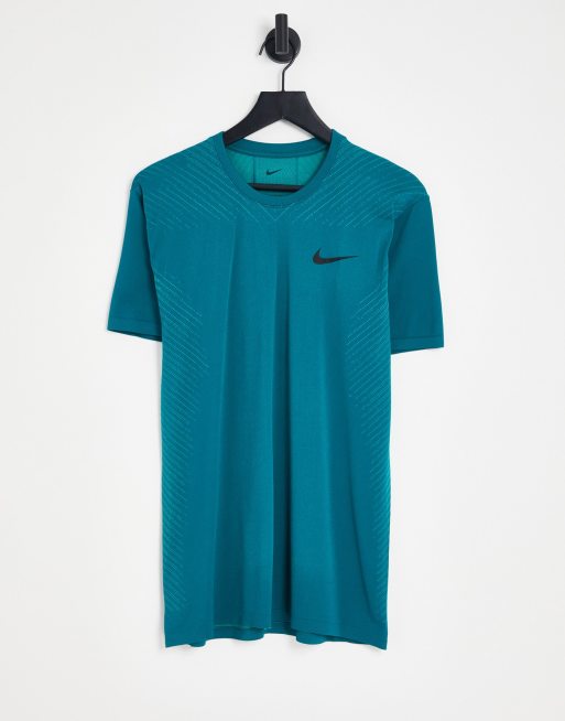 Nike Training - Naadloos en sneldrogend Dri-FIT T-shirt in groenblauw
