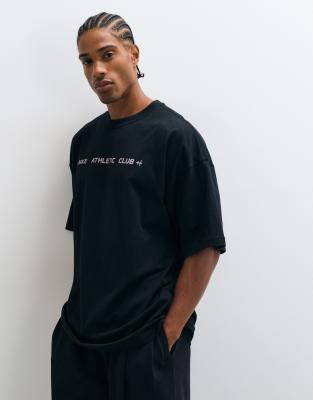 Nike Training NAC oversized t-shirt in black | ASOS