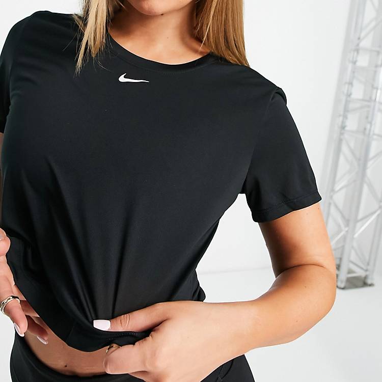 Nike Training One Dri-FIT short sleeve standard crop top in black | ASOS