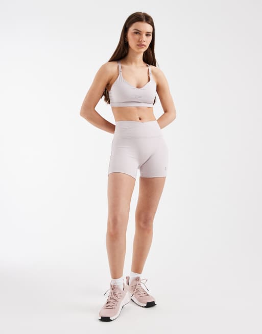 Nike Training One Dri-FIT wrap waist 5 inch shorts in light pink, 3 of 5