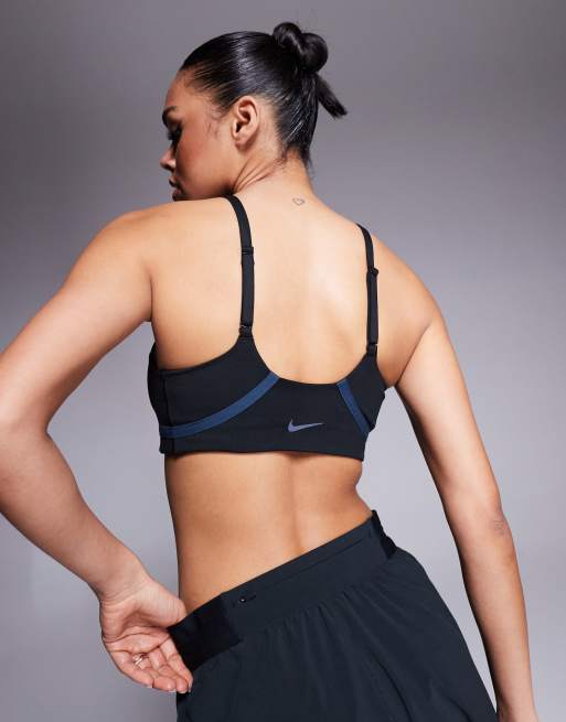 Nike Training One light support contrast stitch sports bra in black, 4 of 4