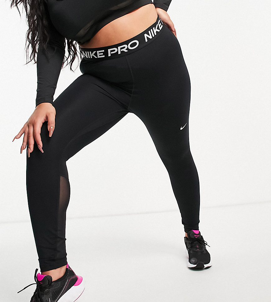 Plus-size leggings by Nike This item is excluded from promo Mid-rise Branded elasticated waist Nike logo print Breathable mesh panels 7/8 length Bodycon fit Figure-hugging cut