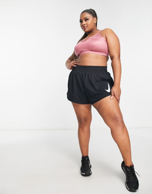 Lånte Premier teleskop Nike Training Plus High Shine Indy light support sports bra in pink | ASOS