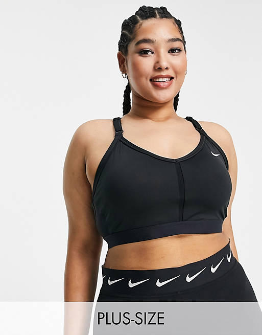 Nike Training Plus Indy light support sports bra in black | ASOS