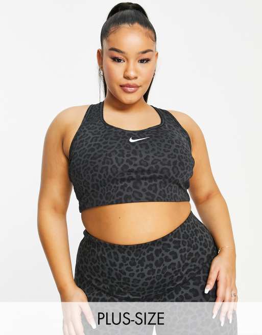 Nike Training Plus Swoosh medium support leopard print sports bra in near  black