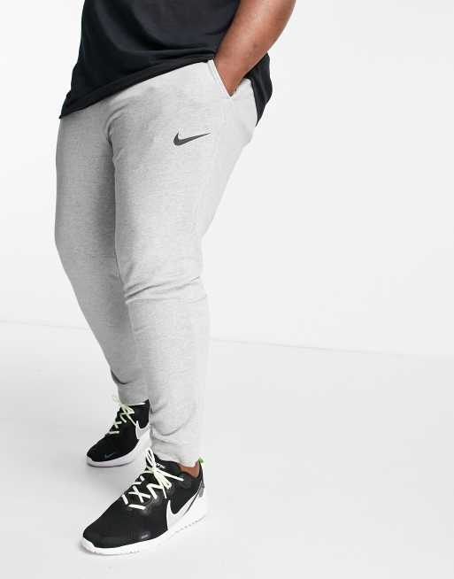 Nike training tapered sweatpants best sale in gray