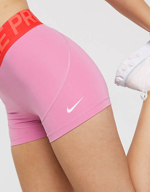 Nike Training Pro 3 inch booty shorts in pink