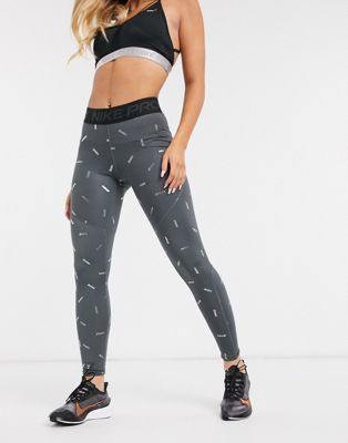 nike tights with nike logo all over