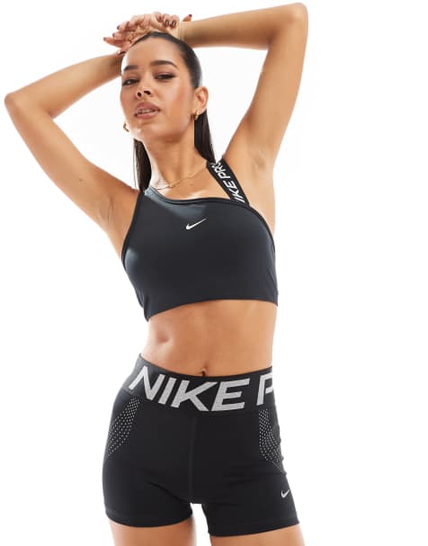 Nike Training Pro asymmetric medium support sports bra in black - view 1