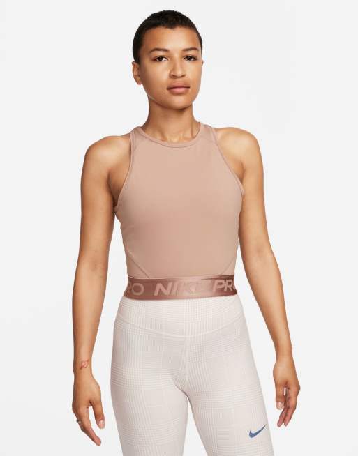 Nike Training Pro crop top in beige | ASOS