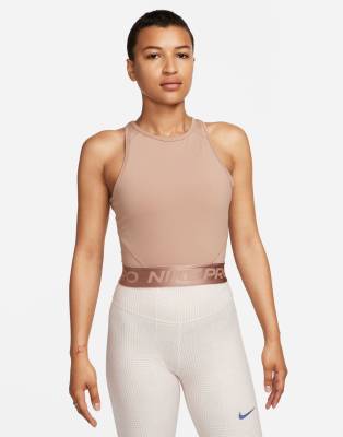 Shop Nike Pro Crop Top In Beige-white