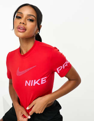 Gelijk Sovjet PapoeaNieuwGuinea Nike Women's Pro Dri-fit Short-sleeve Cropped Graphic Training Top In  University Red/pink Spell | ModeSens