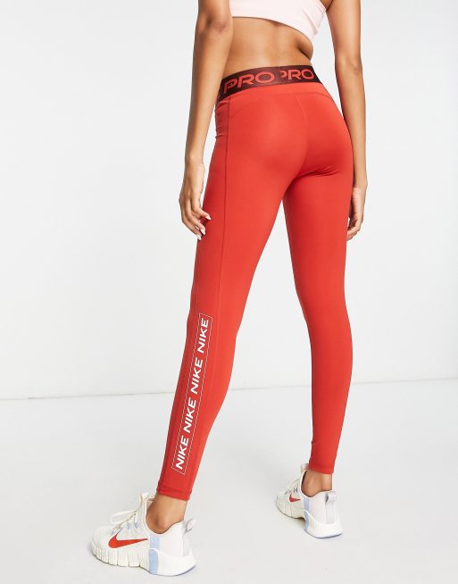 Nike Training Pro Dri-FIT graphic mid rise leggings in red