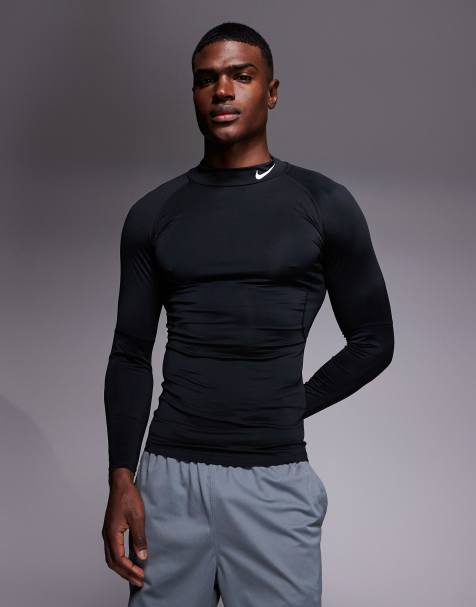 Nike Training Pro Dri-FIT top à manches longues à col montant coupe moulante en noir - view 1