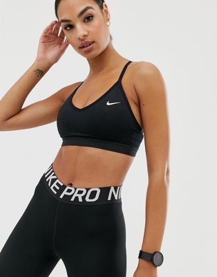 Nike Training Pro Indy light support sports bra In Black | ASOS