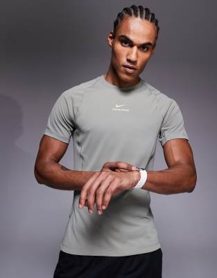 Nike Training - Pro - Top moulant - Vert