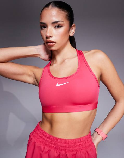 Nike Training - Reggiseno sportivo a sostegno medio rosa con logo Nike - view 1