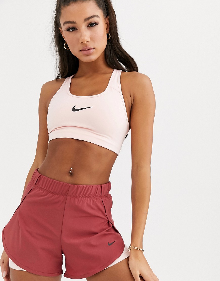 Nike Training - Reggiseno supporto medio rosa con logo