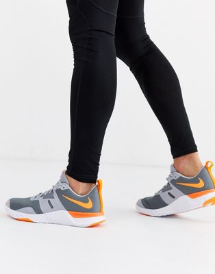Nike Training - Renew Retaliation - Sneakers in grijs met oranje