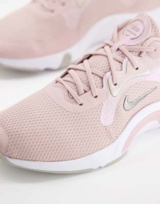 pink nike renew