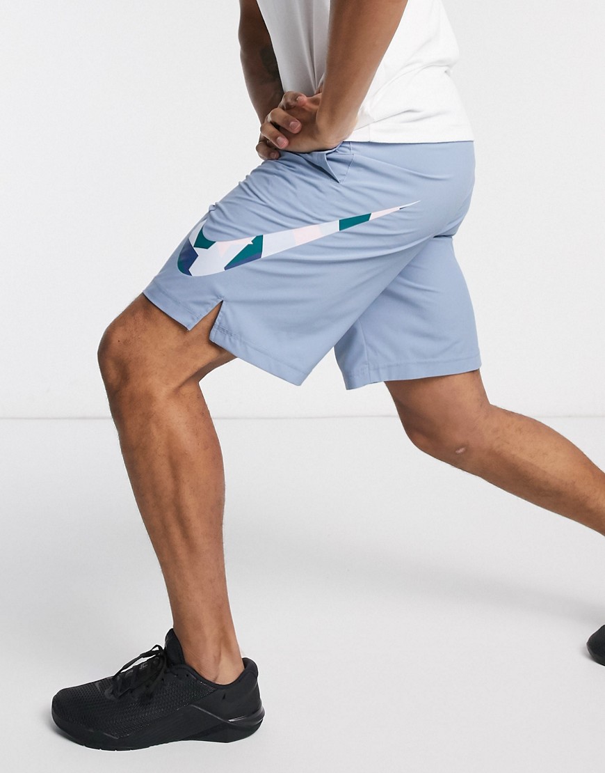 Nike Training shorts with camo swoosh in light blue