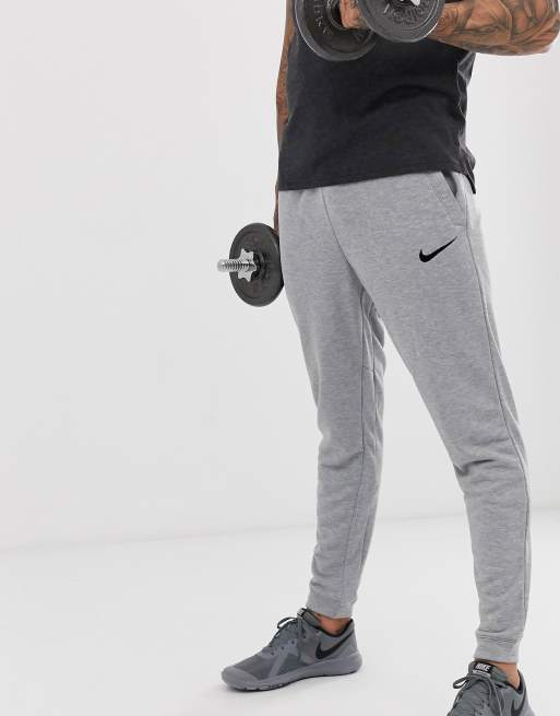 Nike Training - Smaltoelopende fleece broek in donkergrijs