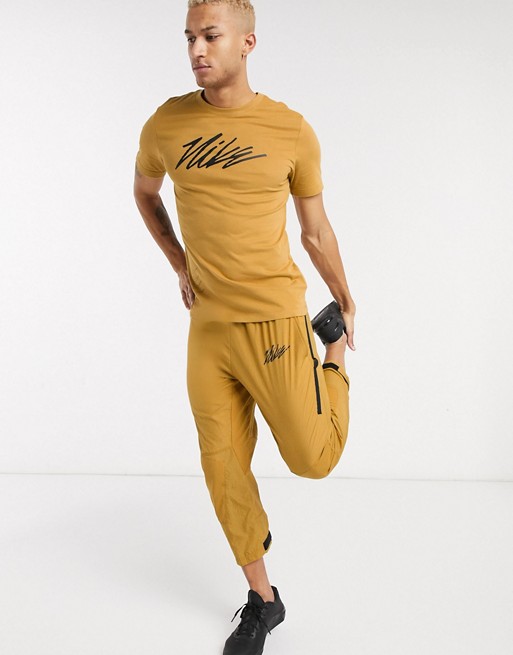 Nike Training Sport Clash trousers in beige