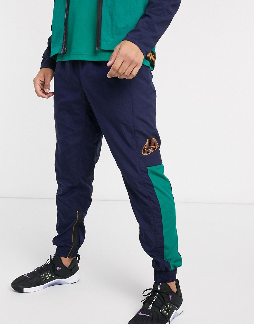 Nike Training - Sport Pack - Marineblå joggingbukser med placement-print