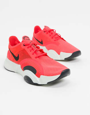 nike training superrep go sneakers in pink