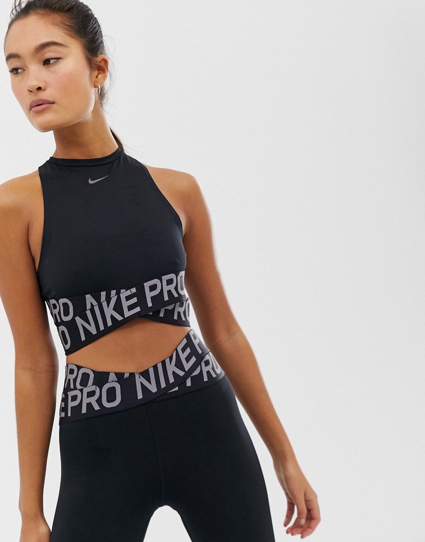 Nike Training – Svart crop top med korsade band