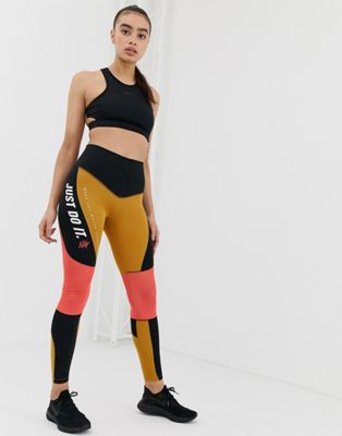 Nike Training – Svarta och guldfärgade leggings med hög midja och färgblock-Flerfärgad
