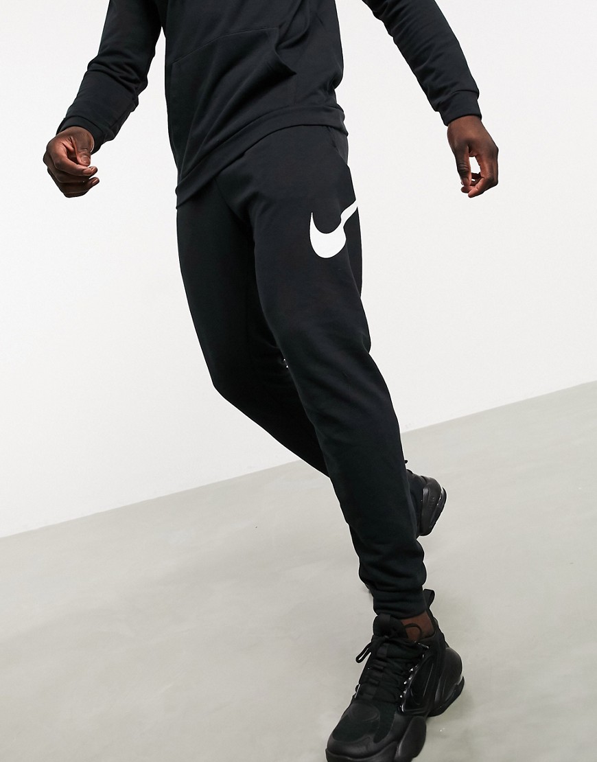 Nike Training sweatpants with leg swoosh in black