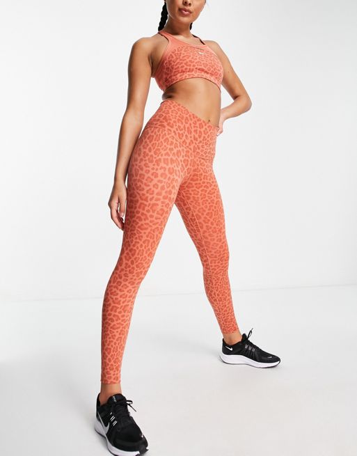 Nike Training Plus Swoosh medium support leopard print sports bra in near  black, DN4631-070
