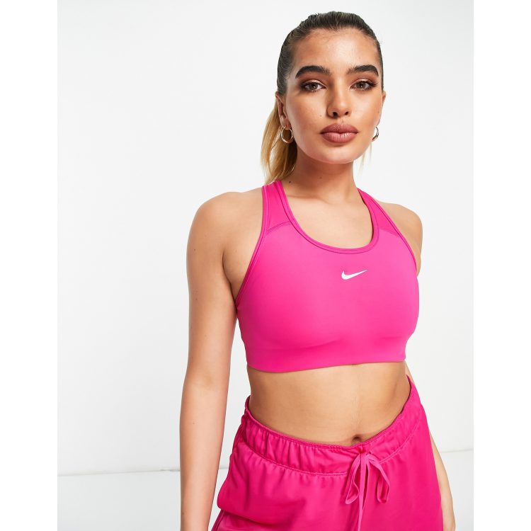 Nike Training Swoosh Dri-FIT leopard print cross back medium support sports  bra in pink